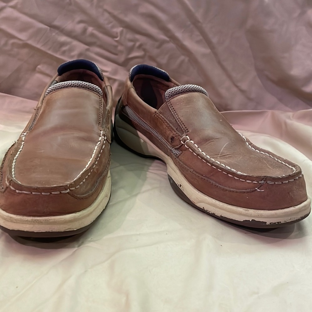 These are sperry shoes and they are the color brown